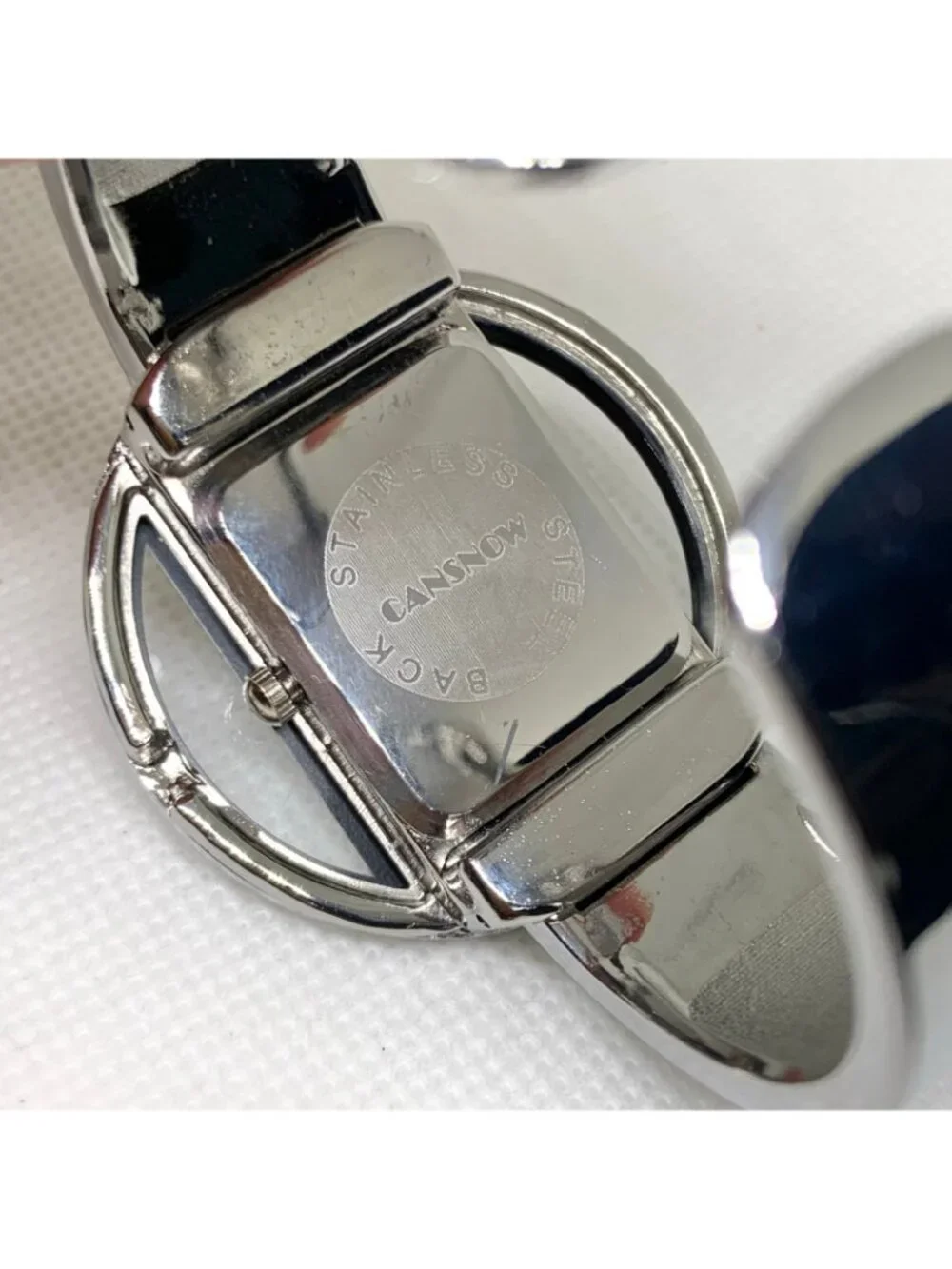 Cansnow silver black tone cuff bracelet women’s watch 42mm  quartz 6.5” running